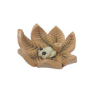 Porta incienso coqui sobre hoja en cerámica